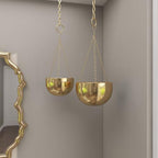 deco 79 metal wall planter, set of 2 on a desk or shelf