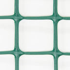 heavy-duty plastic mesh netting, green, 35.4 x 197 shown in use