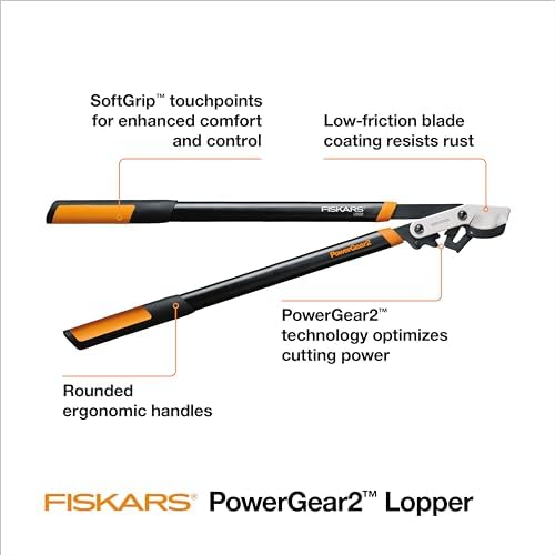 fiskars 32” powergear2 garden bypass loppers, 2" cut shown in use