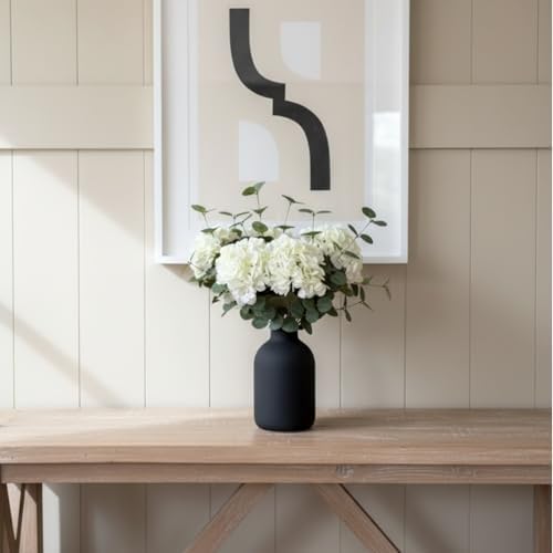 real touch white faux hydrangea and eucalyptus, floral on a desk or shelf