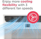 frigidaire 6,000 btu window air conditioner with remote on a desk or shelf