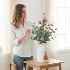 artificial eucalyptus stems in large white vase ,18", close-up detail