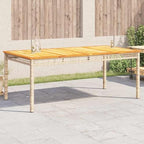 vidaxl patio table beige 70.9"x35.4"x29.5" poly rattan acacia shown in use