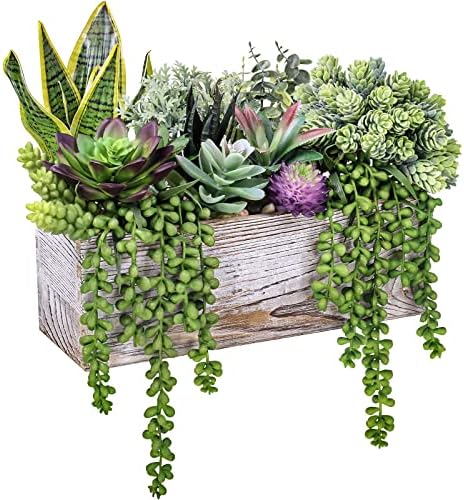 assorted artificial succulents fake plants in rectangular wooden shown in use