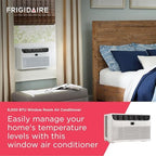 frigidaire 6,000 btu window air conditioner with remote shown in use