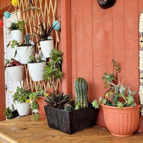 white hanging planter pots self watering vertical garden, close-up detail