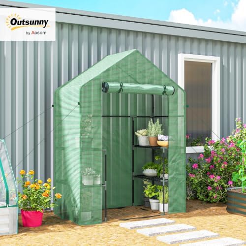 outsunny 5' x 2.5' x 6.5' mini walk-in shown in use