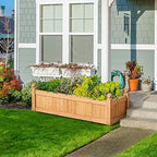 yaheetech 43.5" wooden raised garden bed rectangular planter shown in use