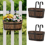 hanging flower pots with drainage holes, wooden railing, front angle view