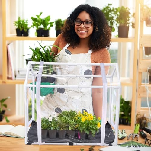 mini greenhouse with potting mat for indoor plant, front angle view