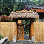 4ft x 6ft natural bamboo fence roll, outside, front angle view