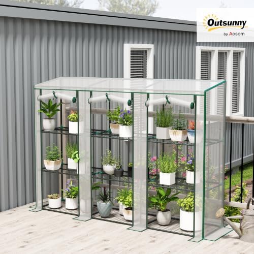 outsunny lean-to greenhouse with 3 tier shelves 84.6" shown in use