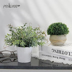 small fake plants in white pulp pot for on a desk or shelf