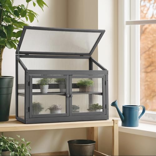 mcombo wooden cold frame garden greenhouse flower planter shown in use