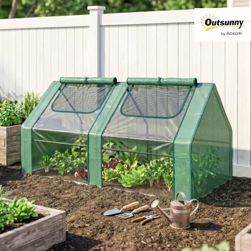 outsunny 6' x 3' x 3' portable greenhouse shown in use