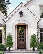 4ft artificial cedar topiary trees, outdoor artificial plants shown in use
