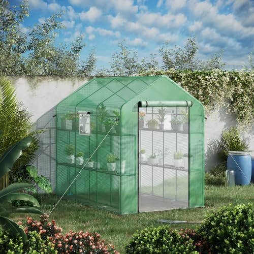 outsunny 7' x 5' x 6' walk-in greenhouse shown in use