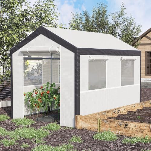 outsunny 10' x 7' x 7' greenhouse walk-in shown in use