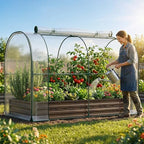 docred galvanized raised garden bed with pvc cover shown in use