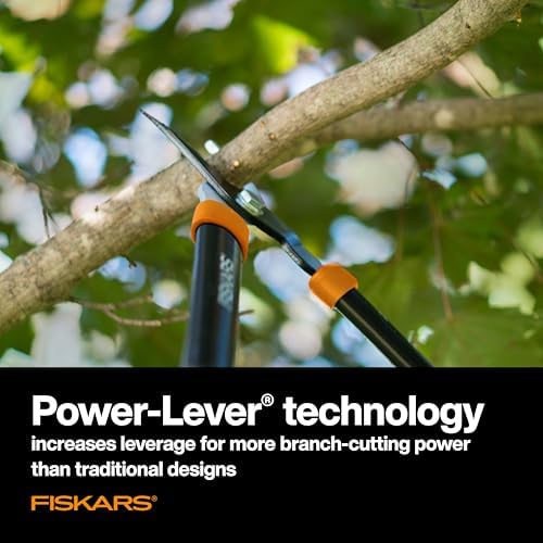 fiskars 28" power-lever garden bypass loppers, 1.75" cut shown in use