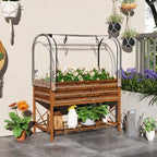 outsunny raised garden bed with cover and storage shown in use