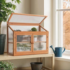 mcombo wooden cold frame garden greenhouse flower planter shown in use