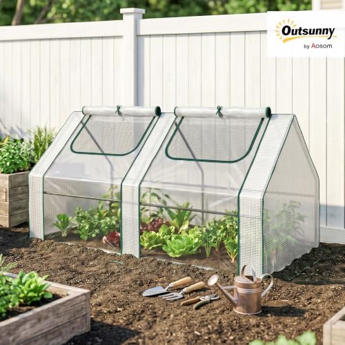 outsunny 6' x 3' x 3' portable greenhouse shown in use