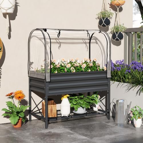 outsunny raised garden bed with cover and storage shown in use