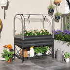 outsunny raised garden bed with cover and storage shown in use