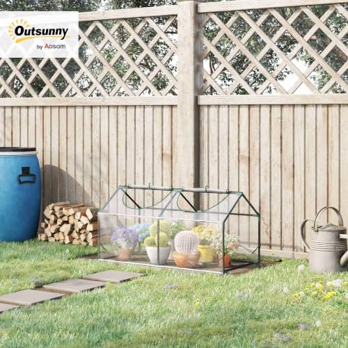 outsunny 4' x 2' x 2' portable mini shown in use