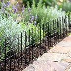 shoplala decorative garden fence border (20 panels) 12in(l) on a desk or shelf