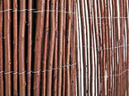 forever bamboo natural willow rolled panel fence natural shown in use