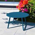 grand patio 28-inch round steel coffee table, outdoor shown in use