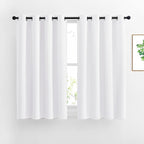 NICETOWN White Small Window Curtain 54 inches Length - (50% Blackout) Thermal Insulated Solid Grommet Sound & Light Reducing Room Darkening Drape for Kitchen/Cafe (1 Panel, W52 x L54)