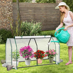 happygrill portable mini greenhouse with roll-up zipper door shown in use