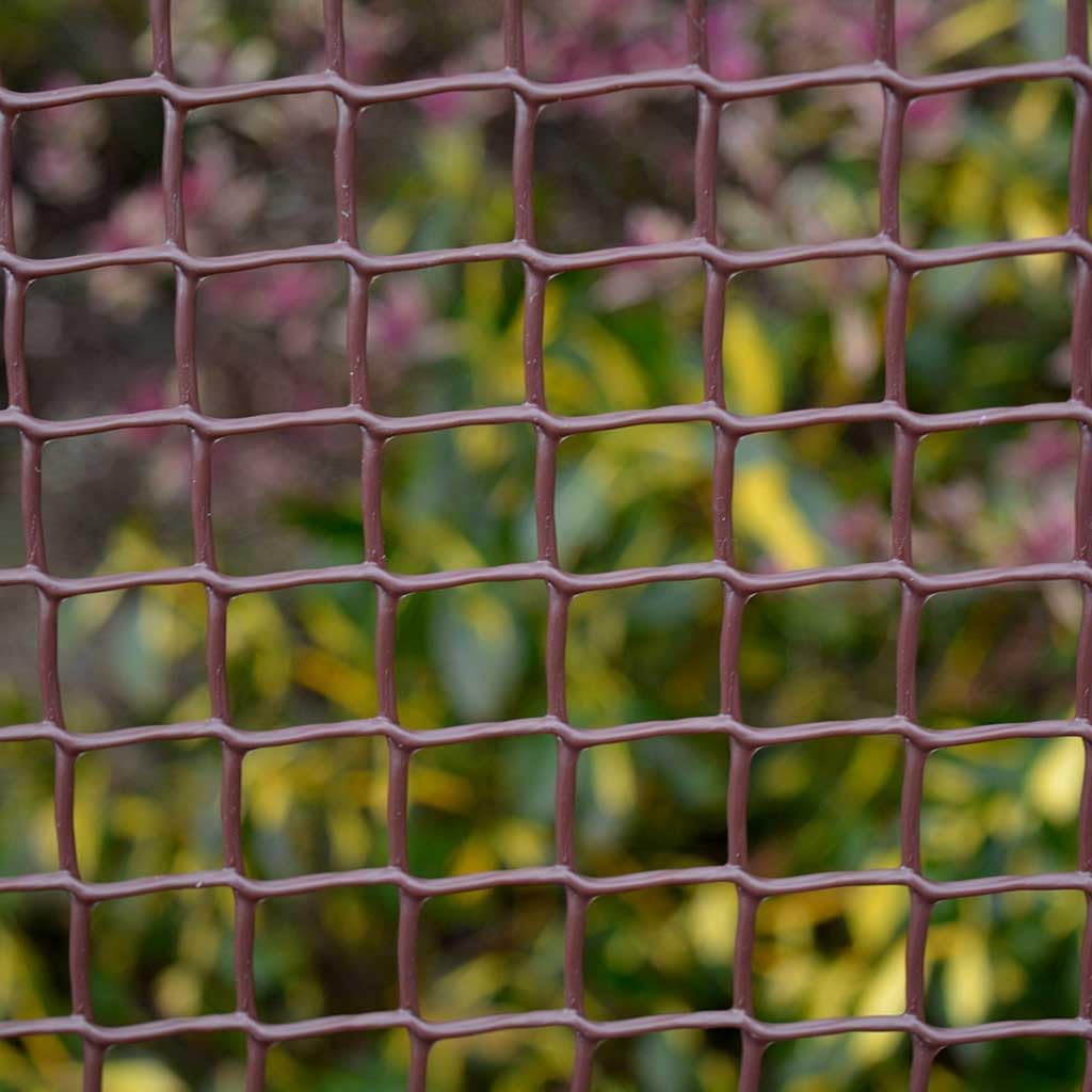 bosmere andersons 50 mm brown plastic garden mesh shown in use