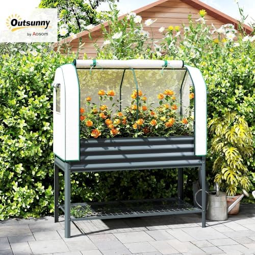 outsunny galvanised raised garden bed with greenhouse cover shown in use