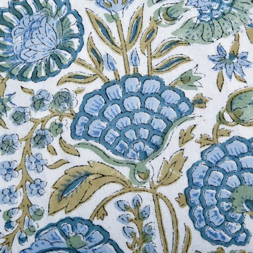 ridhi asparagus green block print ruffle pillow sham on a desk or shelf