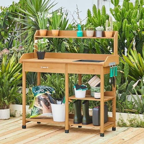 yaheetech potting bench with sink & drawer, outdoor shown in use