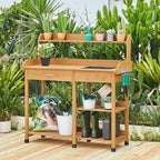 yaheetech potting bench with sink & drawer, outdoor shown in use