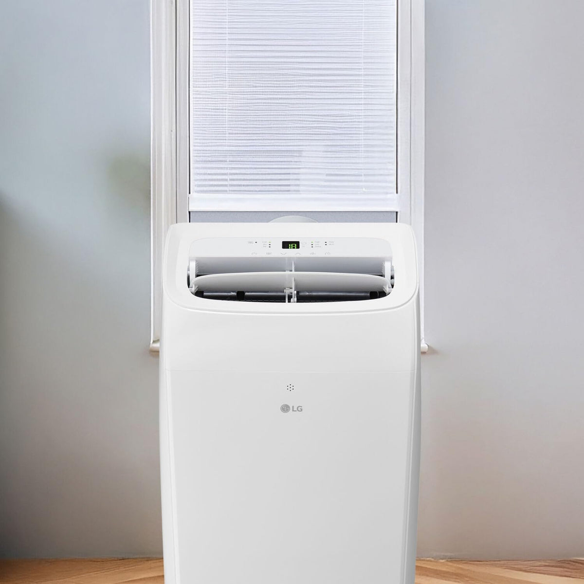 lg 8,350 btu (doe) / 12,000 btu (ashrae) on a desk or shelf