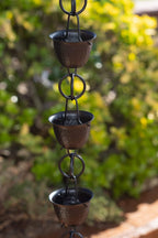 monarch rain chains aluminum hammered cup black rain shown in use