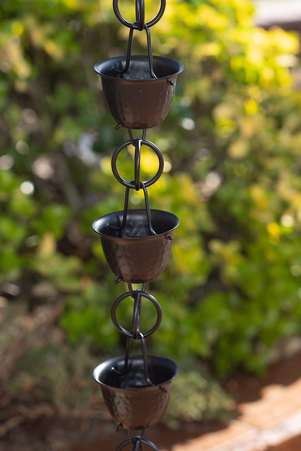 monarch rain chains aluminum hammered cup black rain shown in use