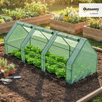 outsunny 9' x 3' x 3' mini greenhouse shown in use