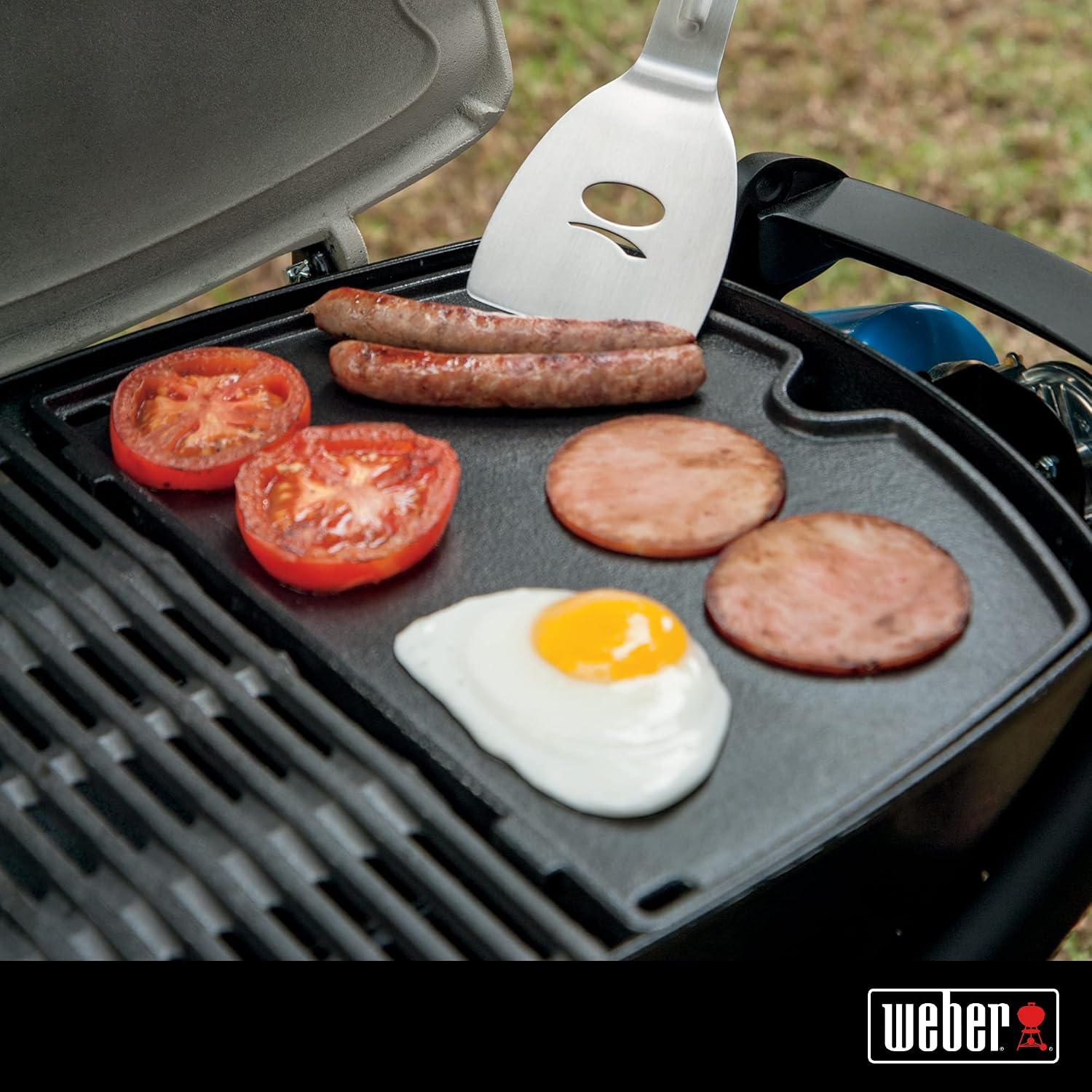 Weber® Q Griddle for Q 100/1000 Series | Porcelain‑Enameled Cast‑Iron Griddle, Superior Heat Retention, Easy‑Clean Surface, No‑Spill Rim, Grill Accessory