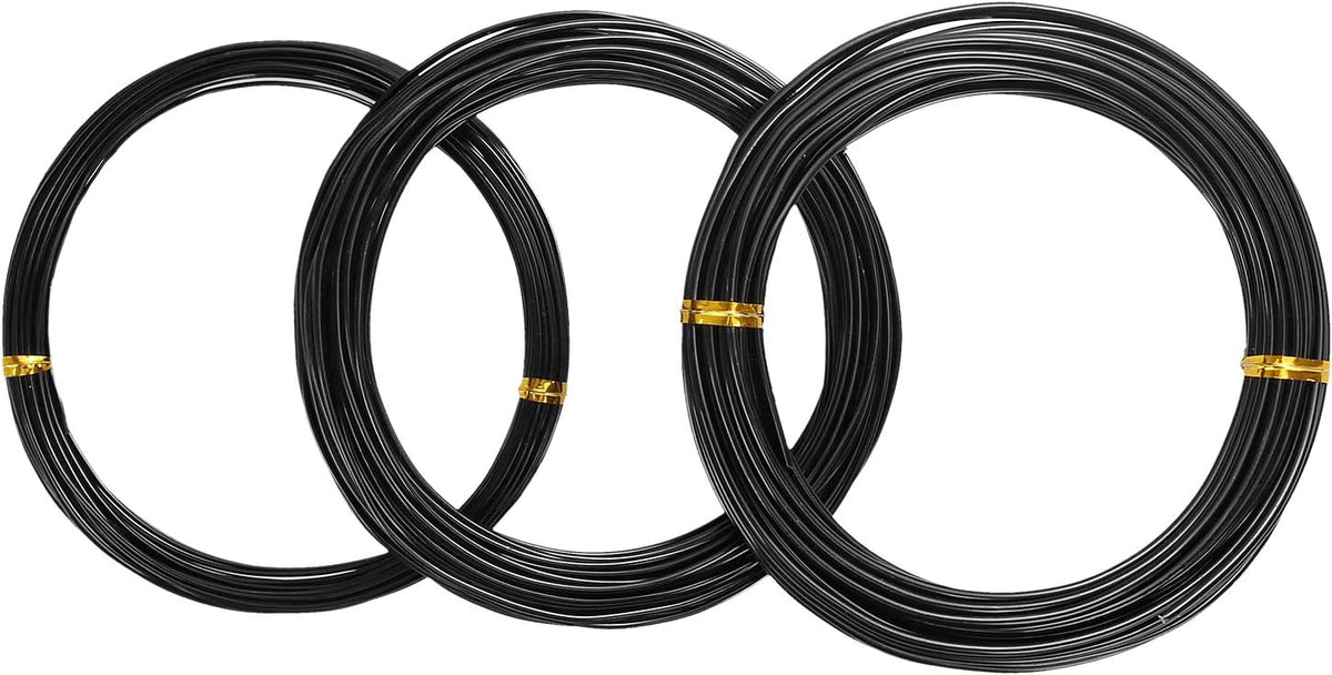 aselected asukvc-2018071415 tree training wires, green,black, close-up detail
