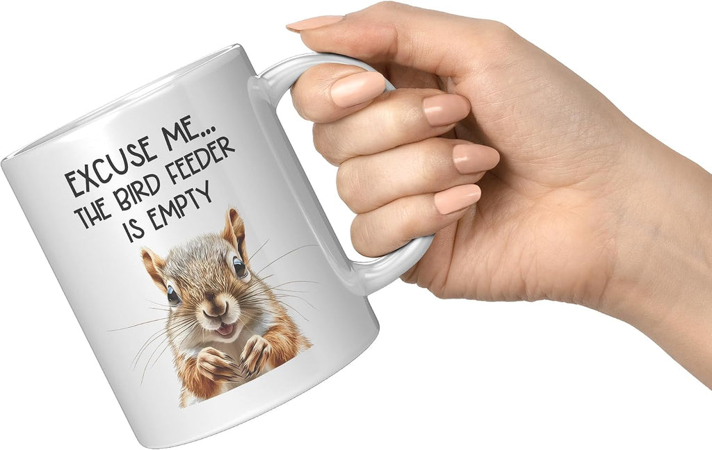 Coveted Goods Funny Squirrel Mug, Excuse Me the Bird Feeder Is Empty 11oz White Ceramic Coffee Mug, Hilarious Gift for Bird Lovers, Birdwatchers, and Backyard Wildlife Enthusiasts