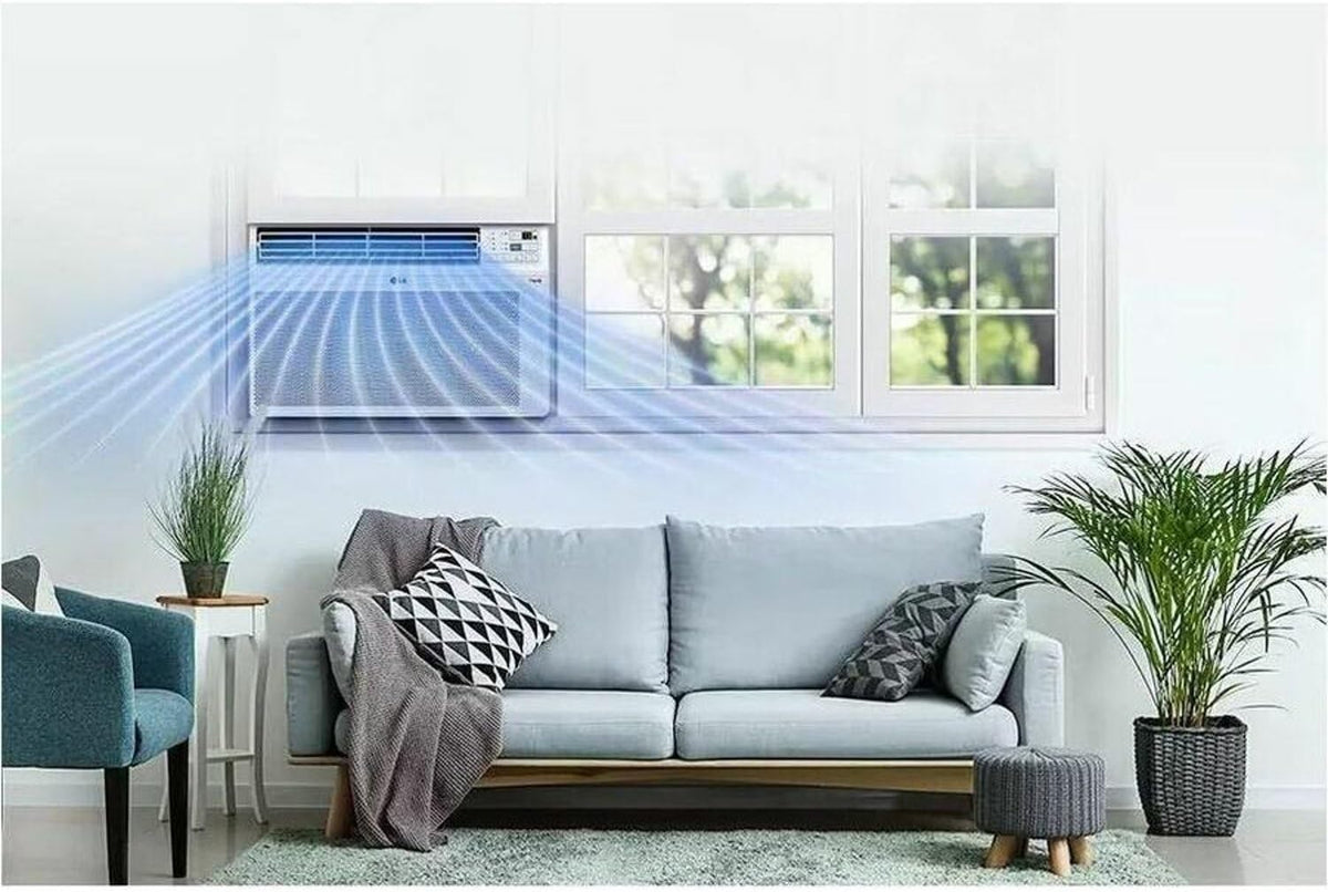 lg 10000 btu window air conditioners [2023] remote shown in use