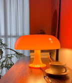 orange mushroom lamp, mid century modern table lamp shown in use