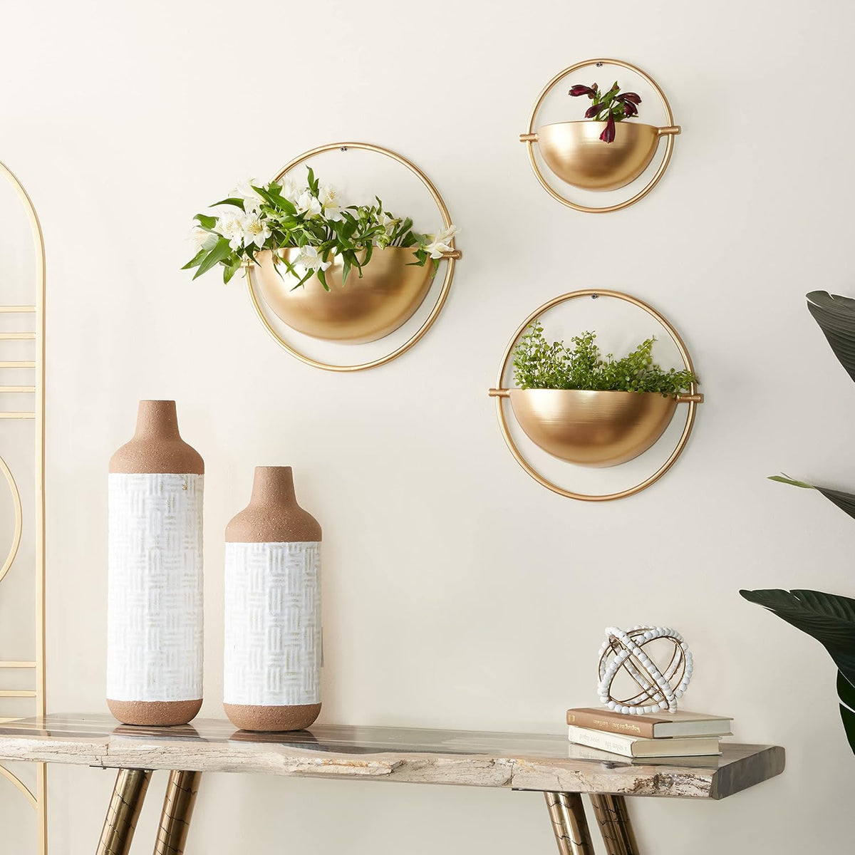 deco 79 metal geometric indoor outdoor wall planter shown in use